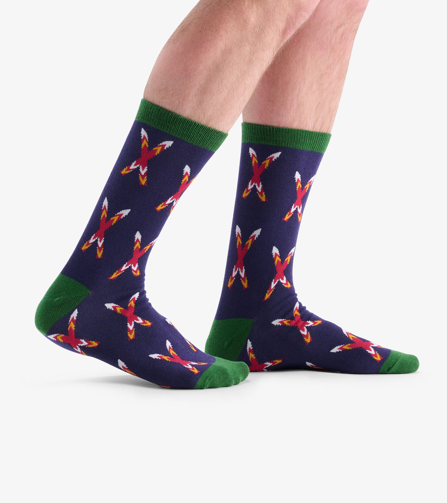 Navy socks with a crossed ski pattern in red and white, featuring green cuffs and soles, suitable for casual wear.