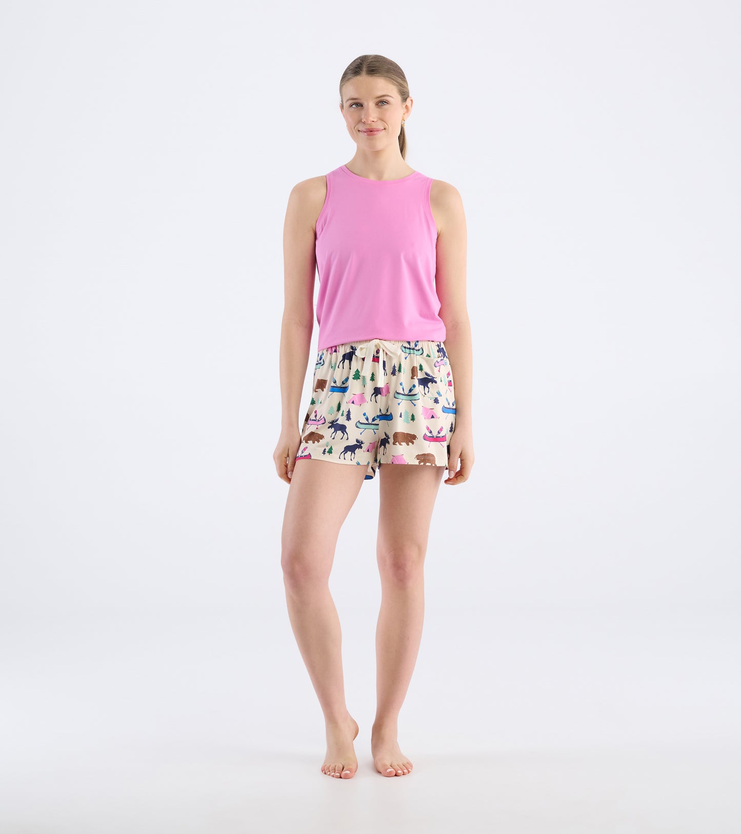 Lightweight pajama shorts with a colorful animal and nature print, featuring an elastic waistband and a relaxed fit.