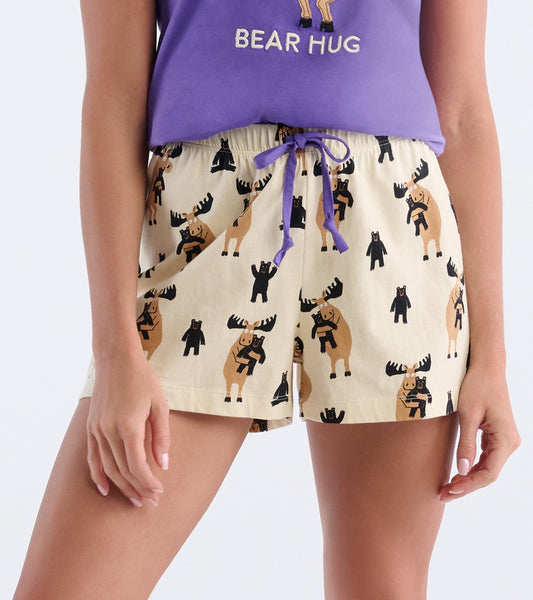 Cotton pajama shorts featuring a playful moose and bear print, with an elastic waistband and drawstring detail.