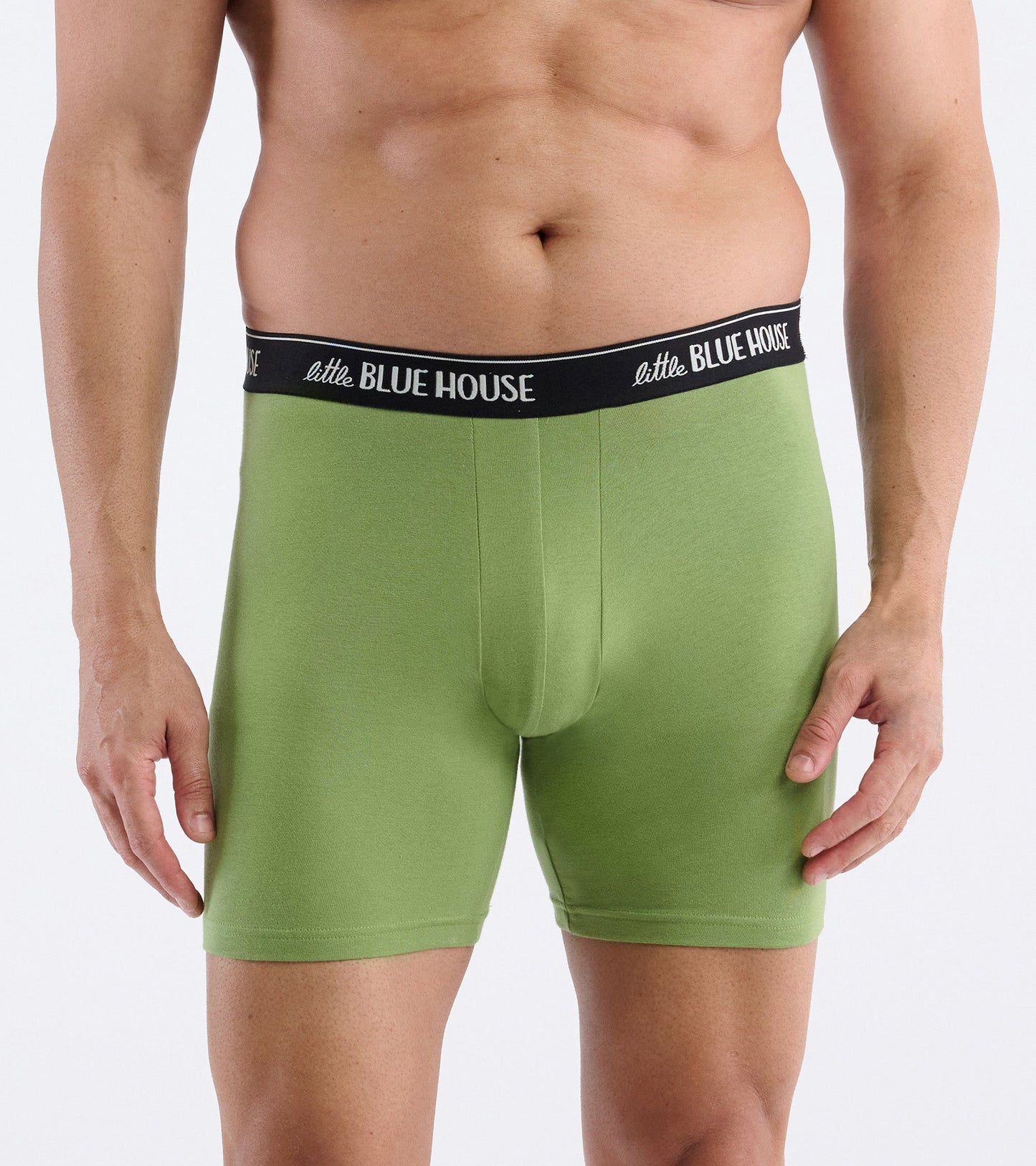 Green boxer briefs with a black waistband, featuring a snug fit and soft material, suitable for everyday wear.