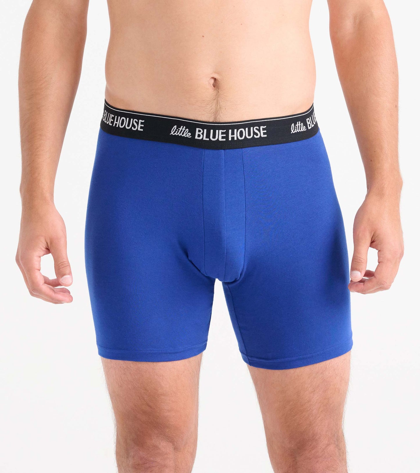 Front view of solid blue boxer briefs with black logo waistband