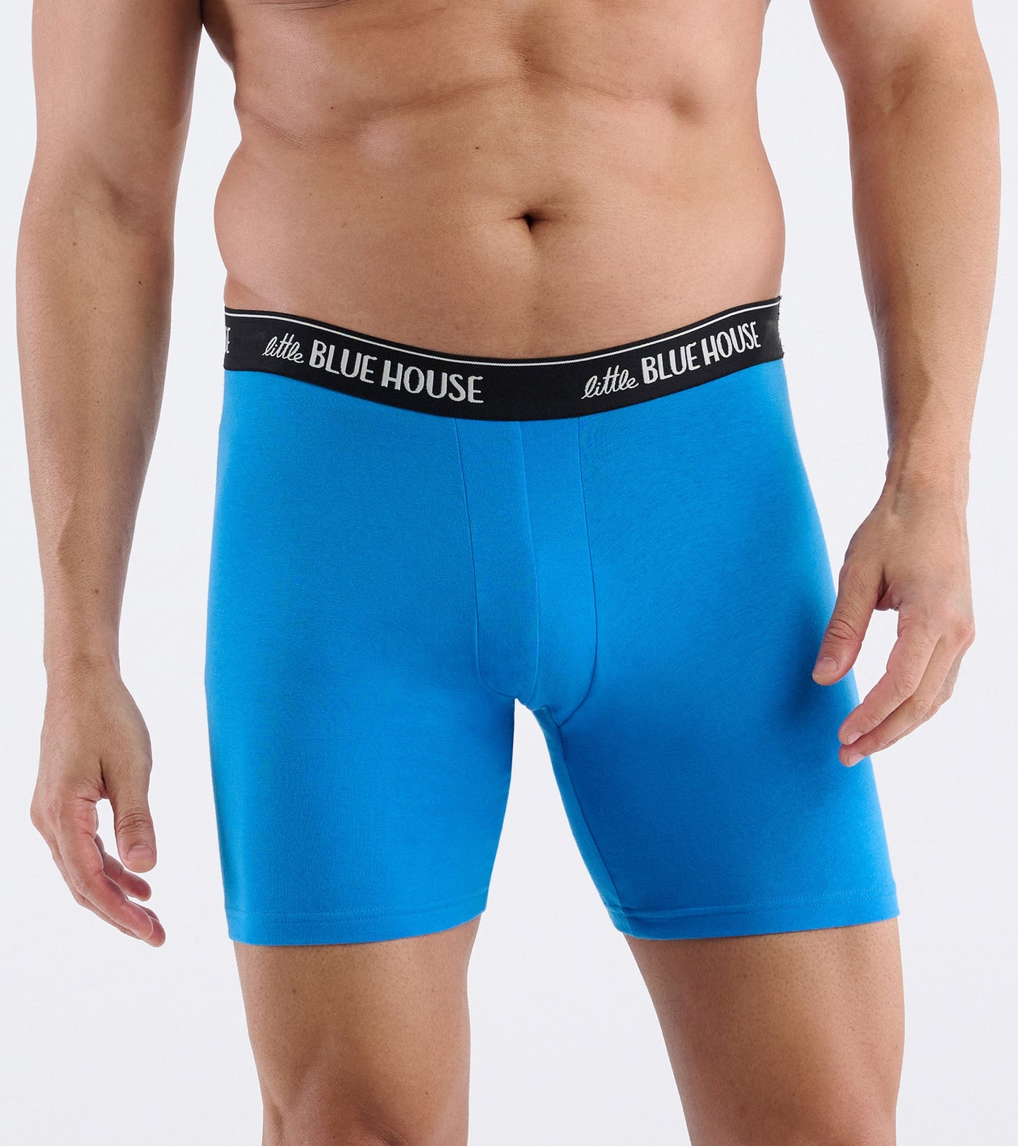 Bright blue boxer briefs with a black waistband, featuring a snug fit and soft material.