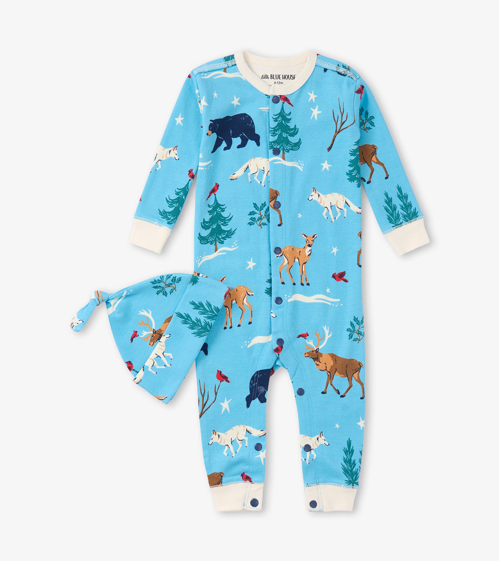 Blue winter sleeper with animal print and matching hat, featuring trees, stars, and wildlife designs.