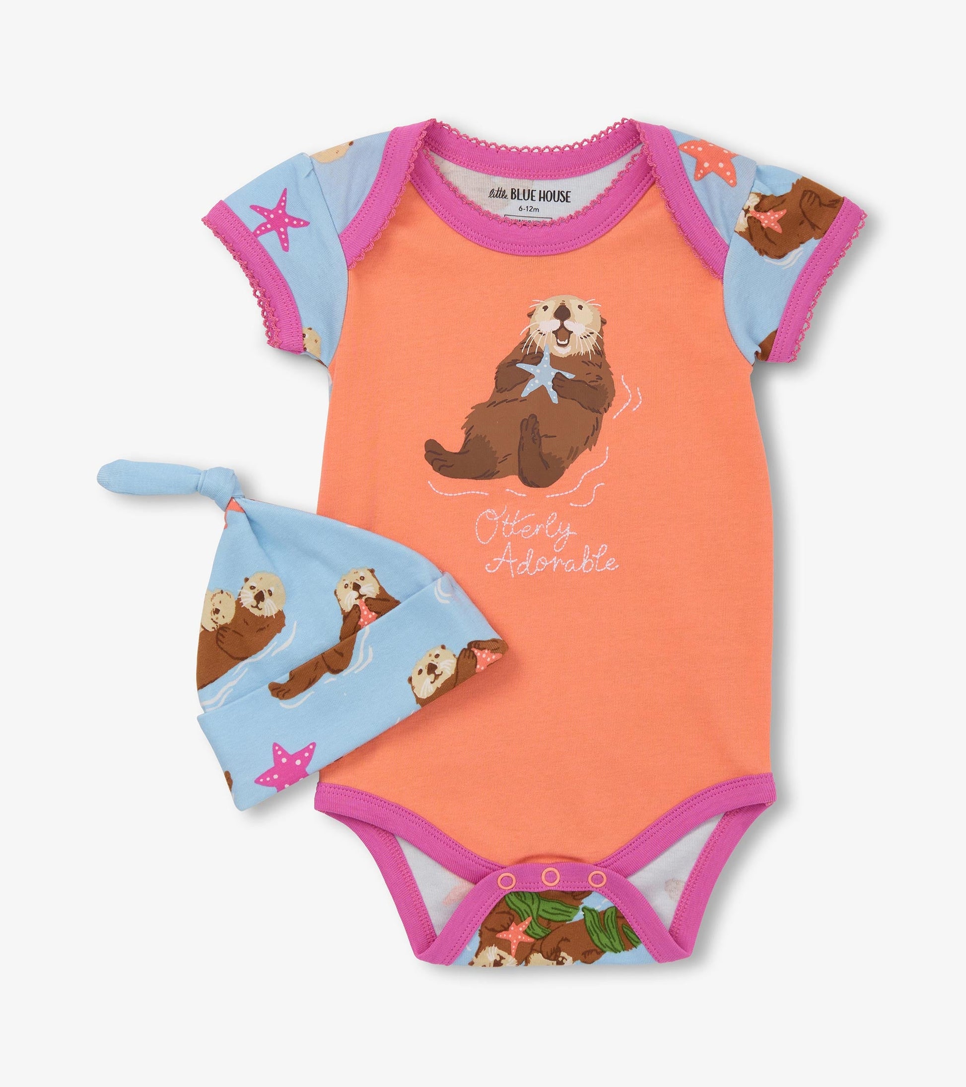 Coral bodysuit with otter print and blue hat featuring otters and starfish, suitable for baby girls.