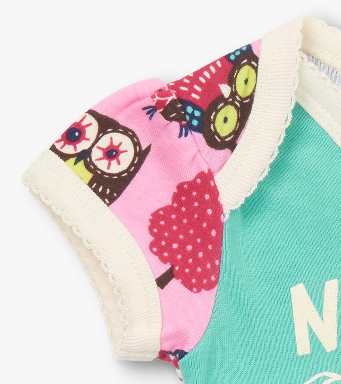 Turquoise bodysuit with owl and tree print sleeves, featuring a scalloped neckline and short sleeves.