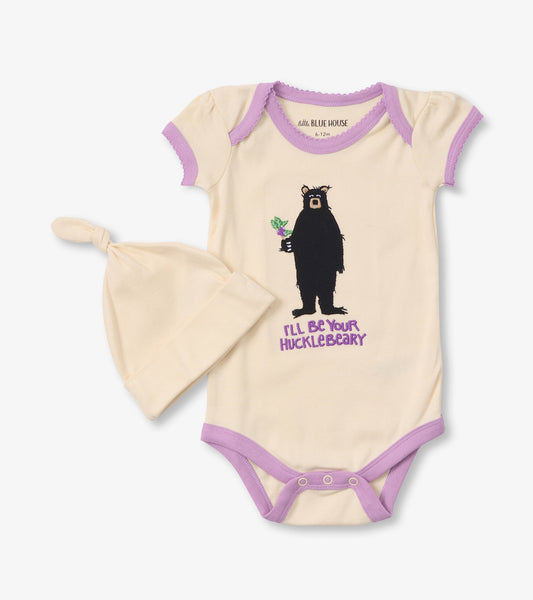 Cream bodysuit with purple trim featuring a bear graphic and matching knot hat. Suitable for infants 3-24 months.