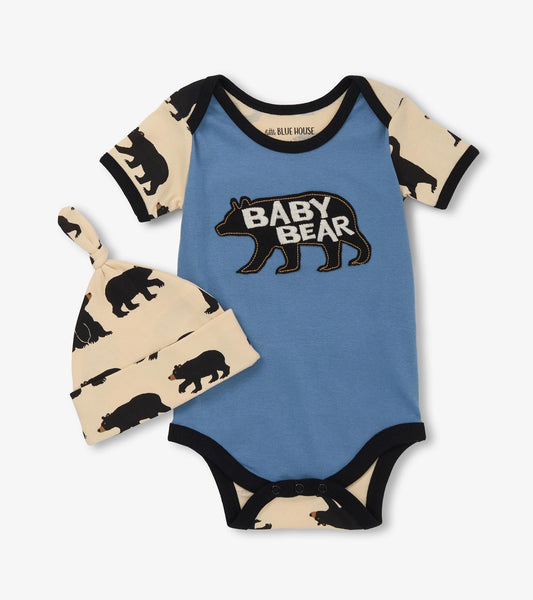 Blue baby bodysuit with "BABY BEAR" graphic and black bear print hat, suitable for infants.