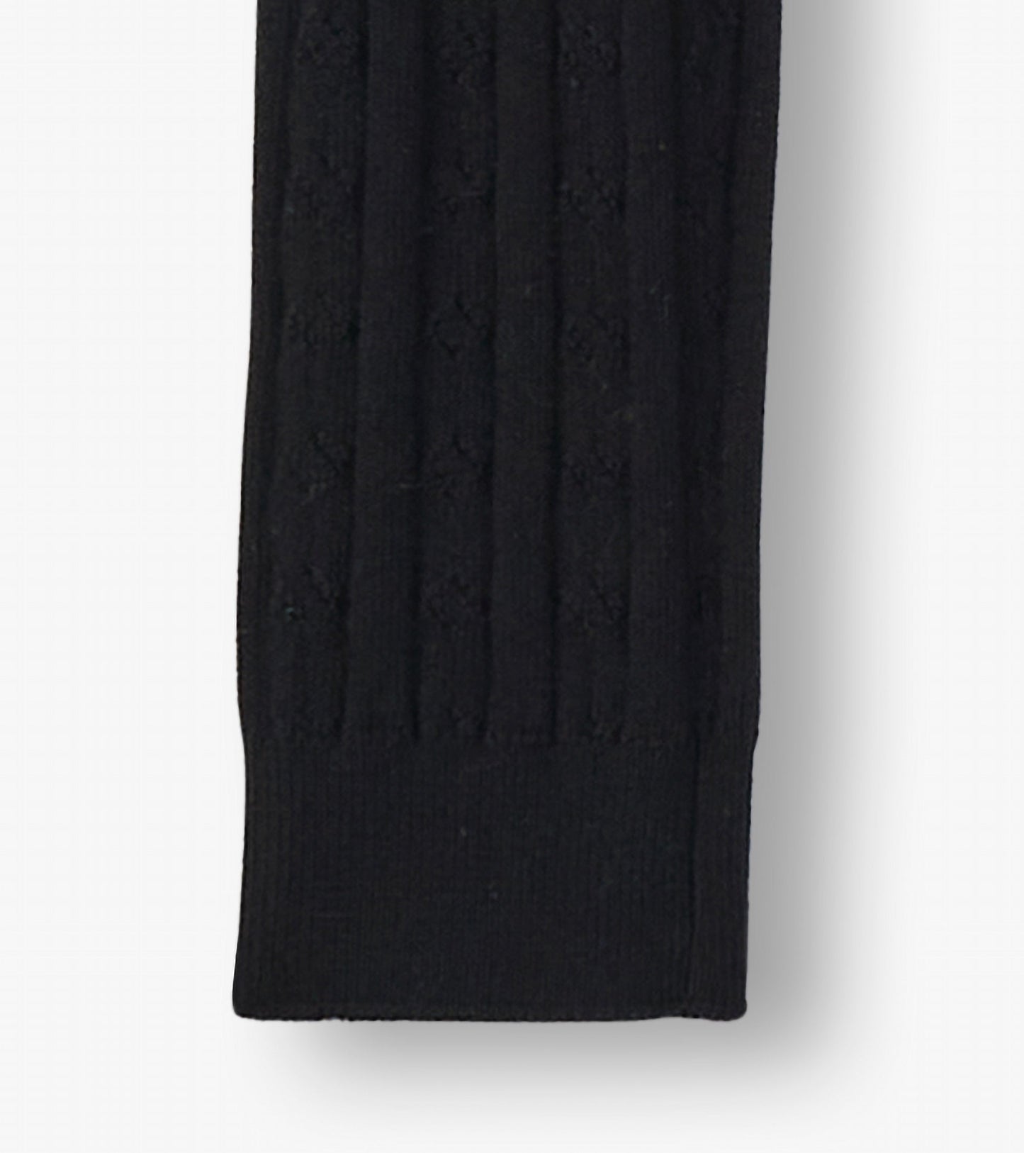 Black cable knit leggings with a textured pattern, suitable for girls, featuring a snug fit at the ankle.