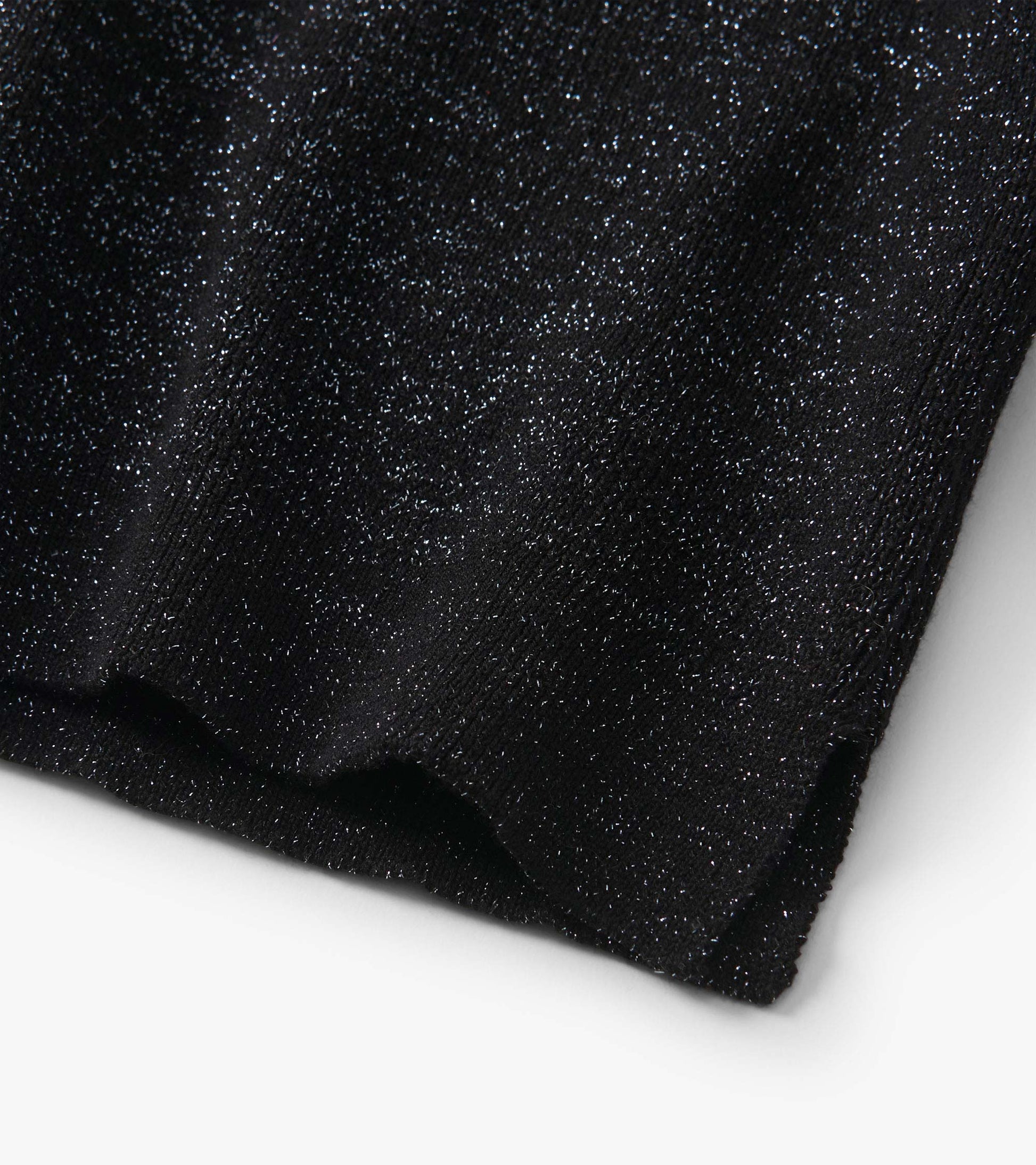 Black glitter turtleneck with a soft texture, featuring a snug fit and ribbed hem, suitable for casual wear.