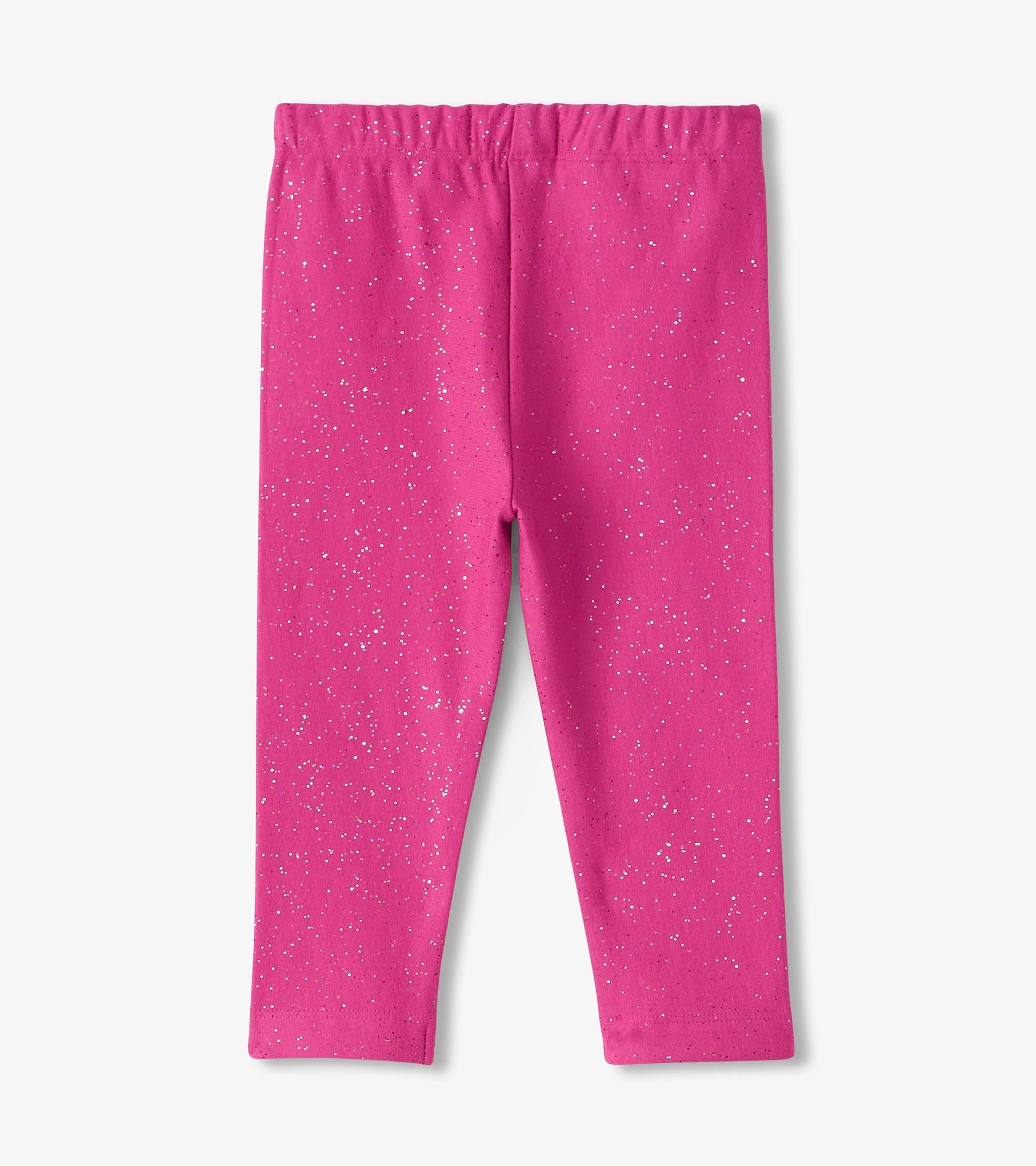 Bright pink cozy leggings with a glittery pattern, featuring an elastic waistband for comfort.