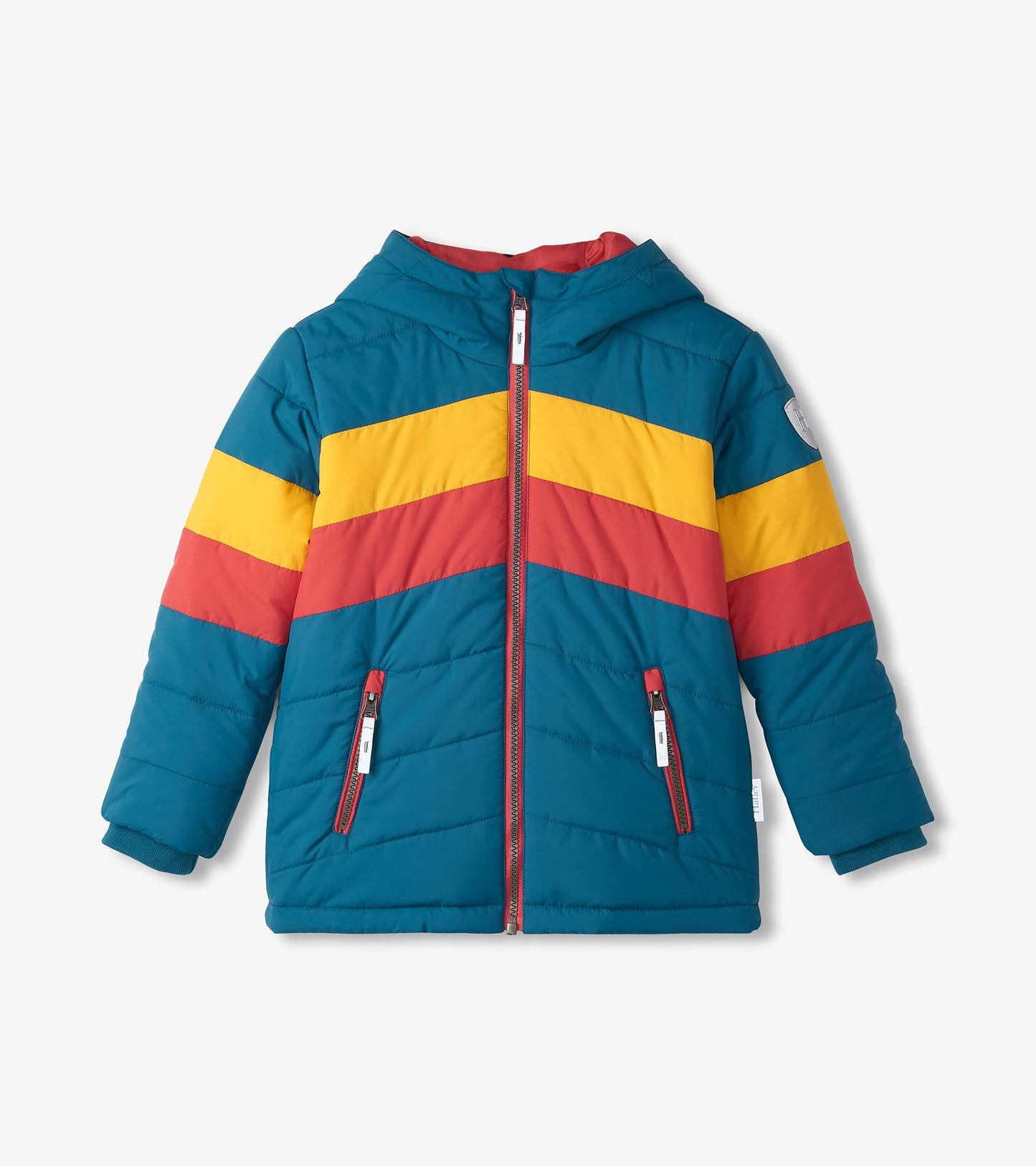 Teal puffer jacket with bold yellow, red, and blue color blocks, featuring a hood and zippered pockets.