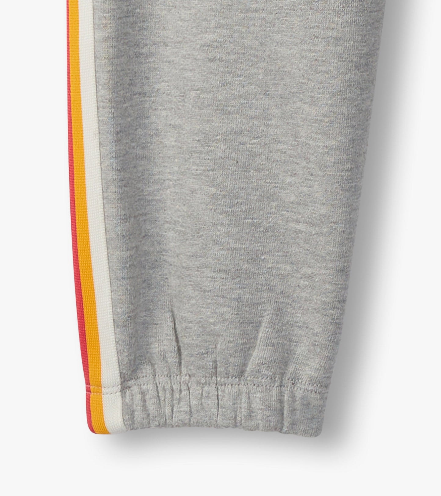 Grey baggy track pants featuring colorful side stripes and elastic cuffs, ideal for athletic wear.