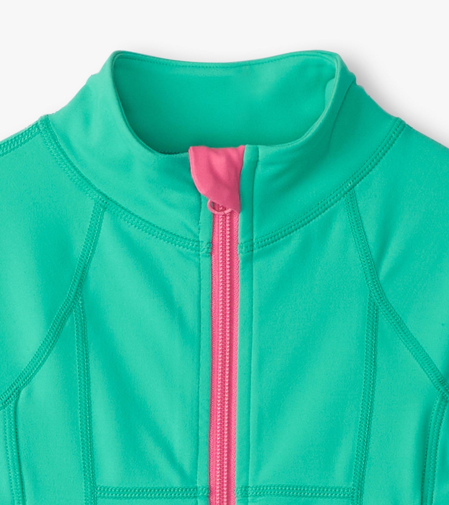 Aqua green active jacket with a pink zipper and high collar, featuring a smooth, stretchy fabric ideal for active wear.