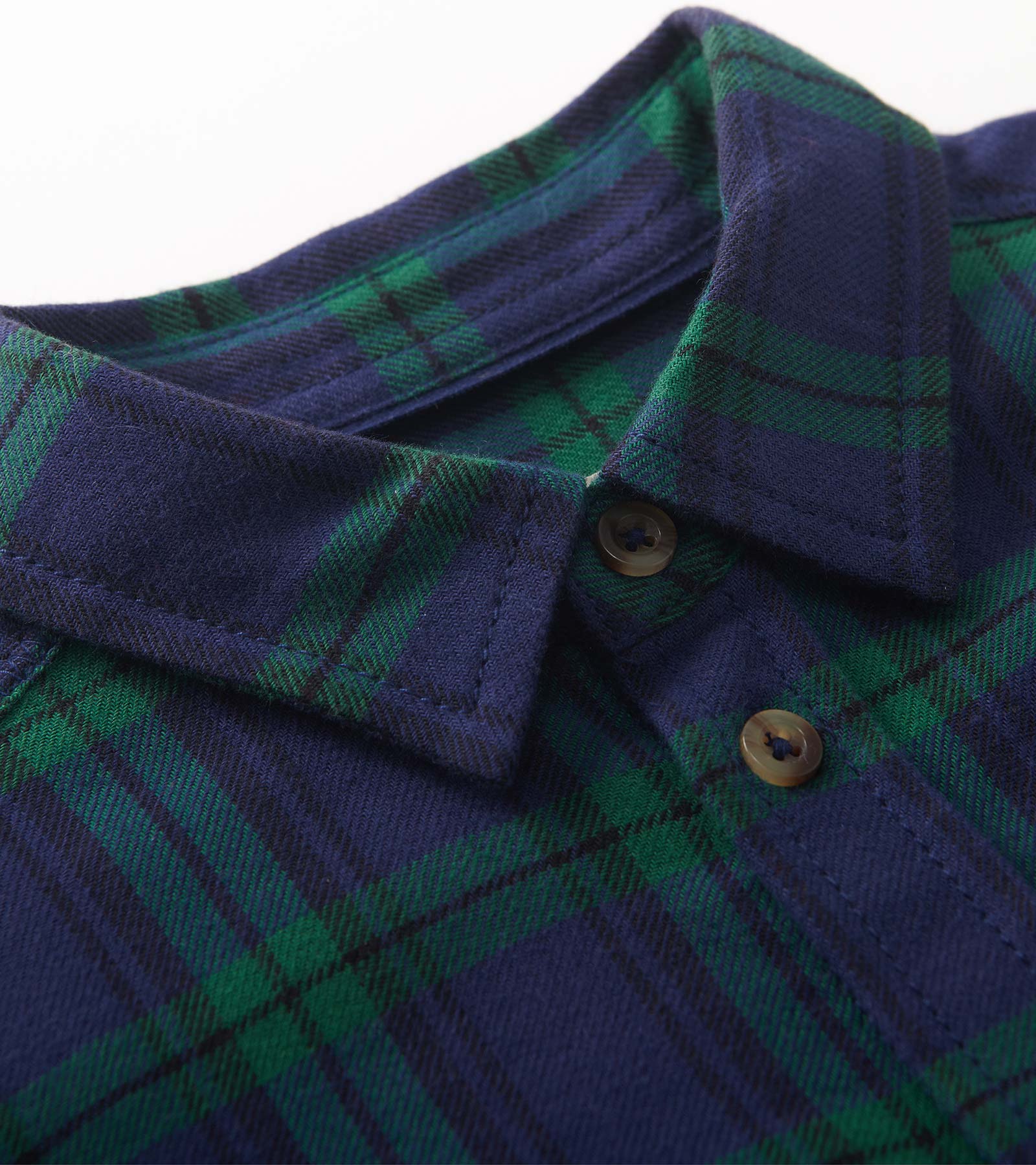 Blackwatch plaid button-down shirt featuring navy and green colors with a classic collar and button closure.