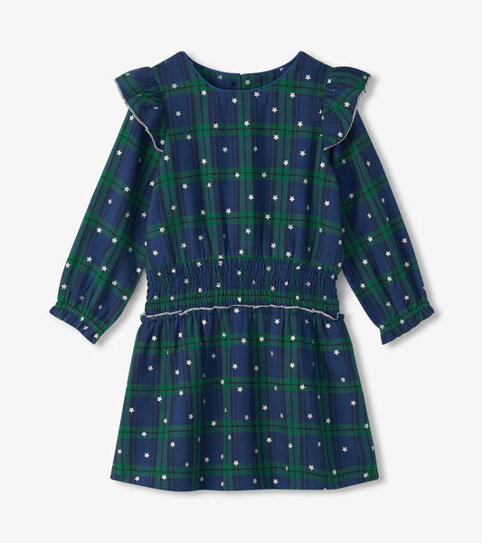 Navy and green plaid dress with smocked waist and ruffled sleeves, featuring white star accents.