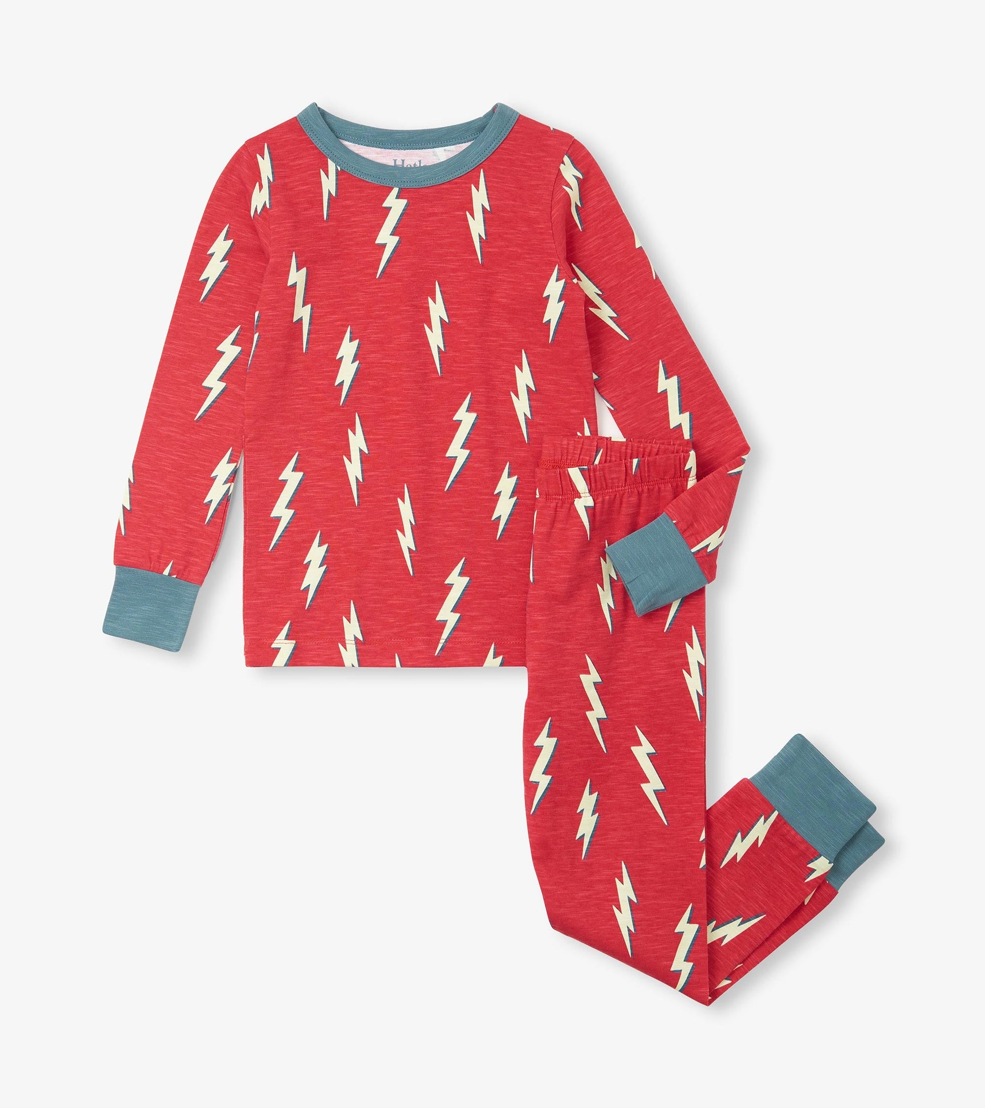 Red pajama set featuring a lightning bolt pattern, with long sleeves and elastic waistband, in soft fabric.