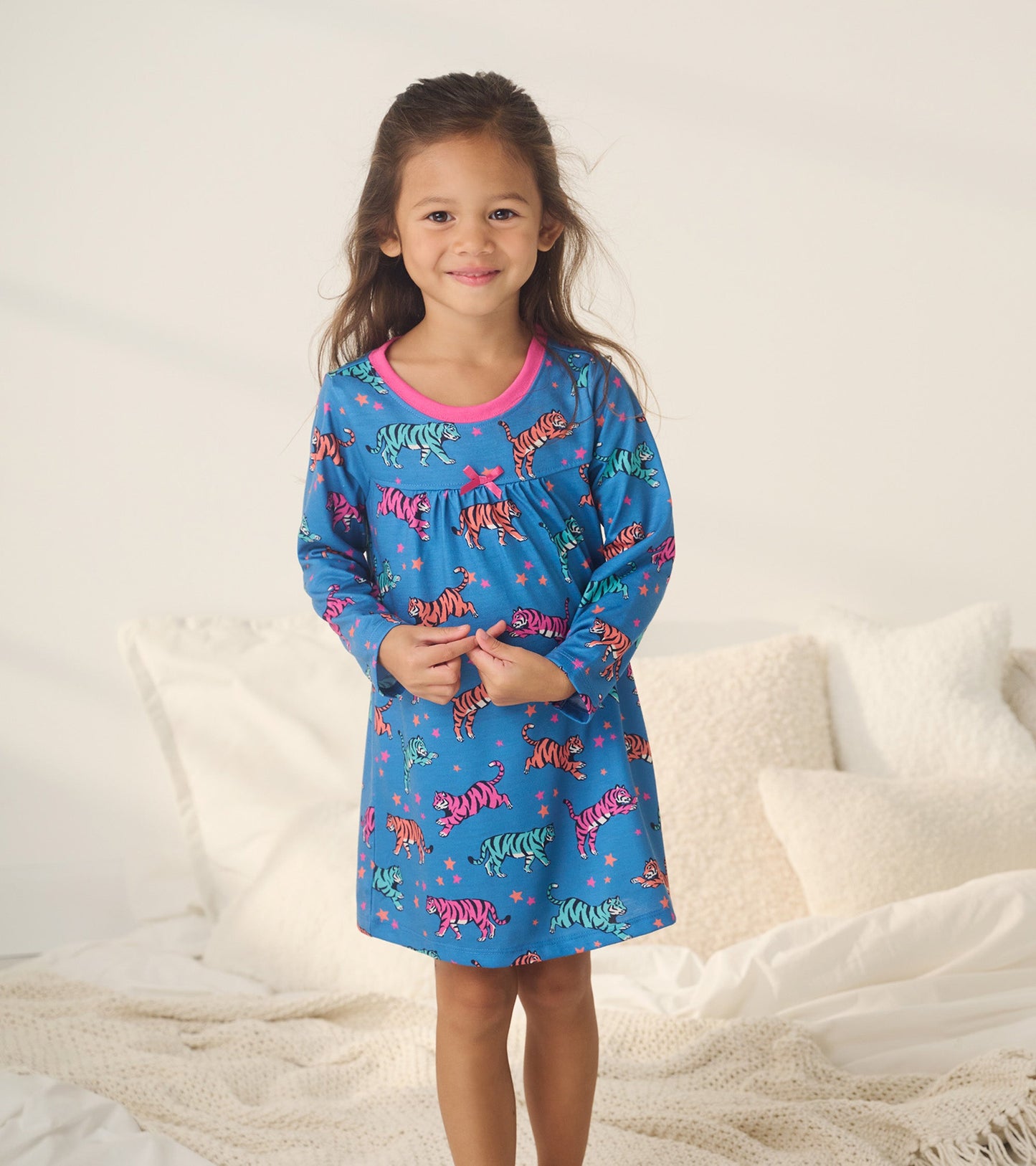Blue nightgown featuring colorful celestial tigers and stars, with long sleeves and a round neckline.