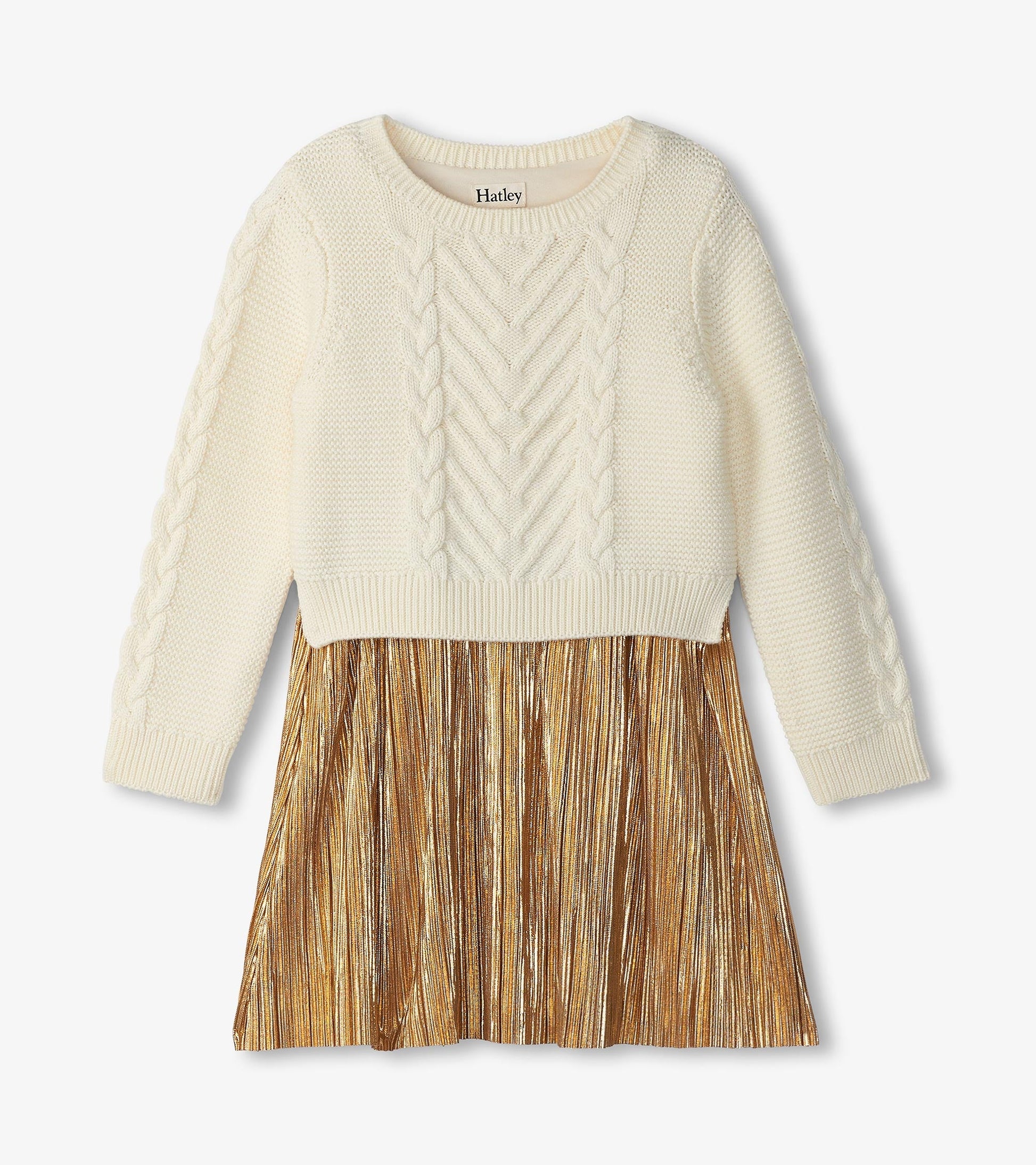 Cream knitted top with cable pattern and a gold pleated skirt, perfect for holiday occasions.