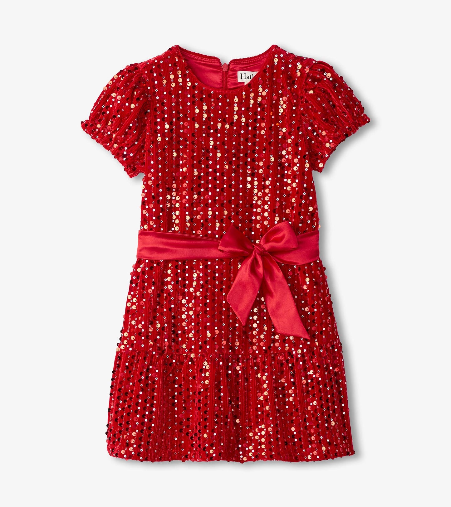 Red velvet dress adorned with sequins, short puff sleeves, and a satin bow at the waist.