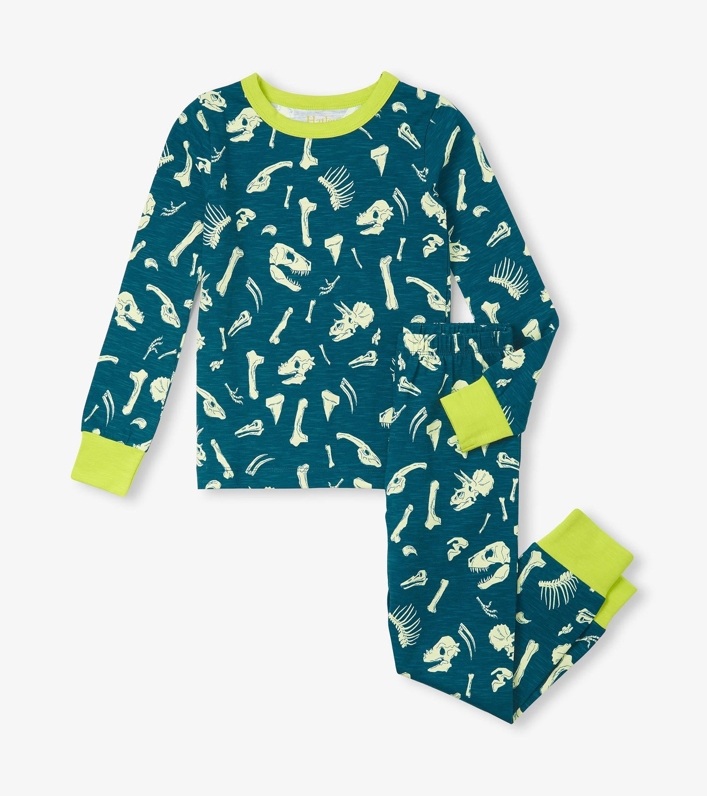 Teal pajama set featuring dinosaur fossil prints, with long sleeves and elastic waistband, accented by lime green cuffs.