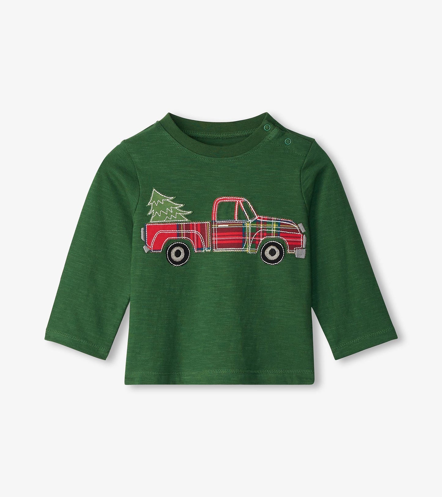 Green long sleeve t-shirt featuring a red plaid truck with a Christmas tree design on the front.
