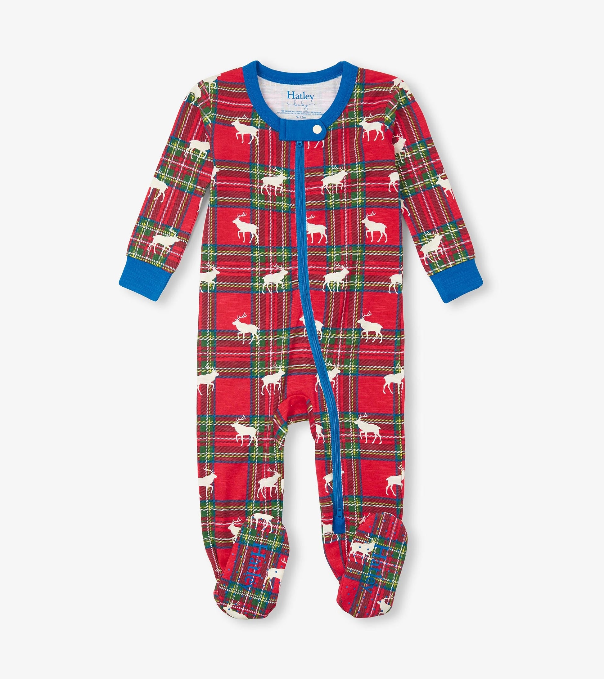 Red plaid footed sleeper with white elk print, featuring long sleeves and a blue neckline, suitable for infants.