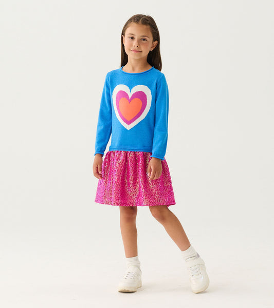 Blue sweater dress with a large heart graphic, featuring a pink sparkly dropped waist skirt. Ideal for casual wear.