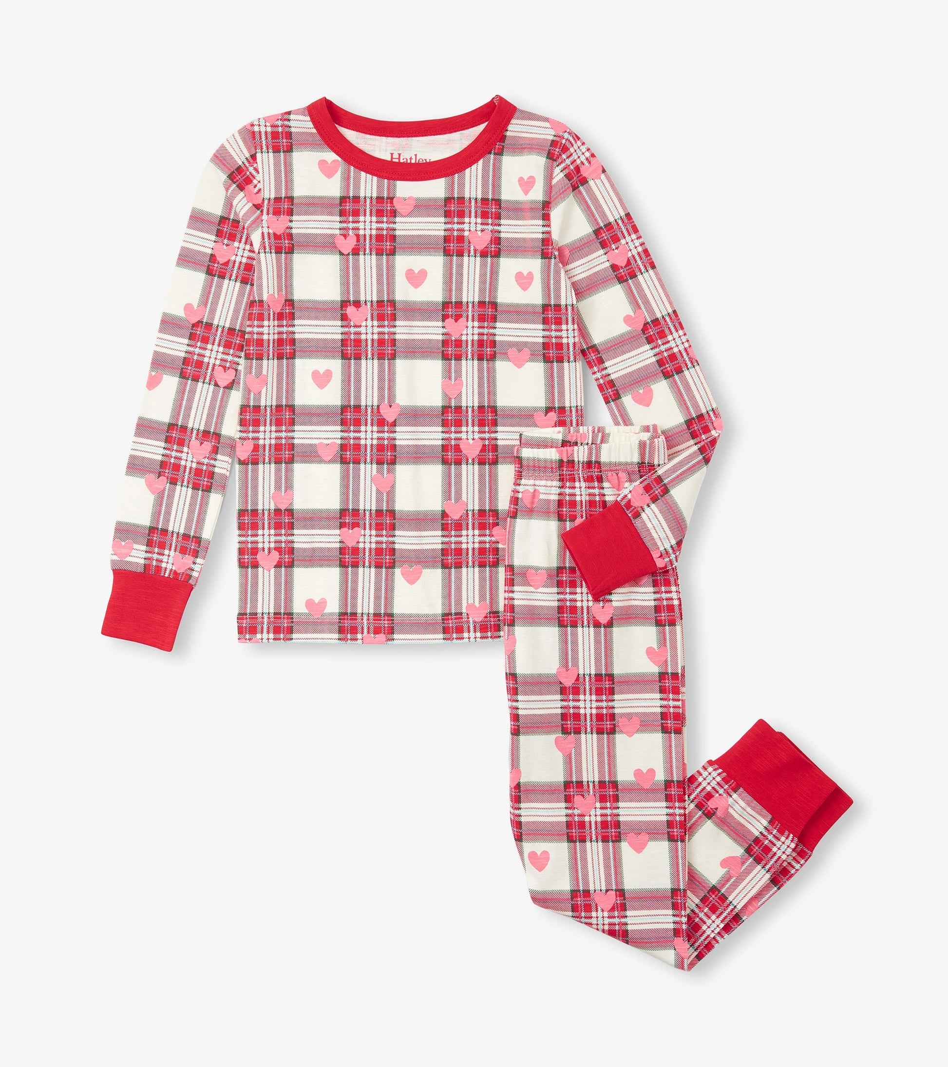 Red and white plaid pajama set featuring pink hearts, long sleeves, and elastic waistband pants.