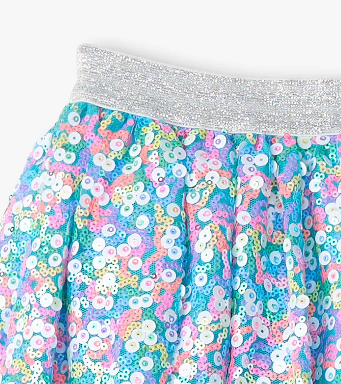 Multicolored sequins adorn a tulle skirt with a sparkly silver waistband, perfect for festive occasions.