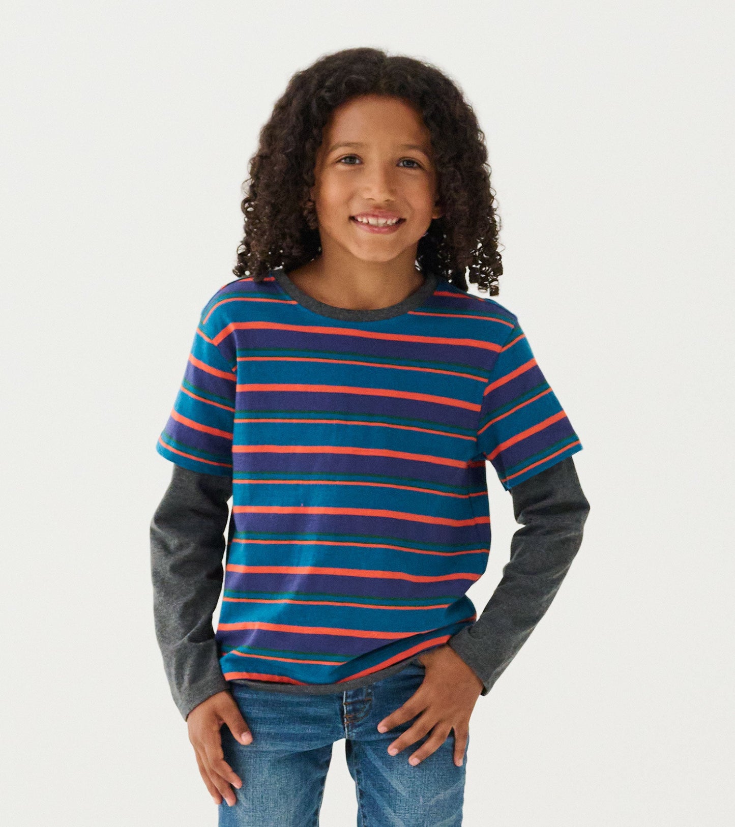 Boys' long sleeve T-shirt featuring a blue base with colorful horizontal stripes and gray sleeves.