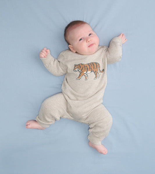 Beige sweater romper featuring a tiger graphic, designed for baby boys, with snap closures for easy dressing.