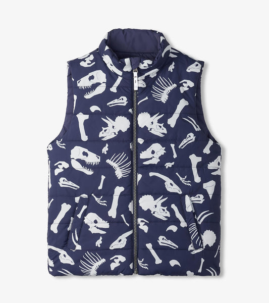 Navy quilted vest featuring white dinosaur fossil prints, with a high collar and side pockets.