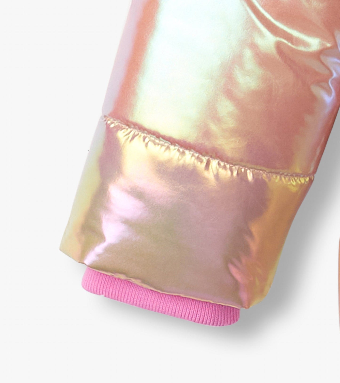 Shiny pink puffer jacket sleeve with ribbed pink cuff, showcasing a smooth, reflective material.