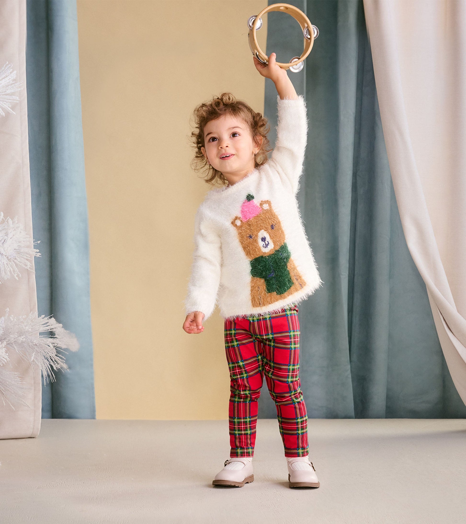 Red plaid leggings for babies and toddlers, featuring a snug fit and soft material, perfect for casual wear.