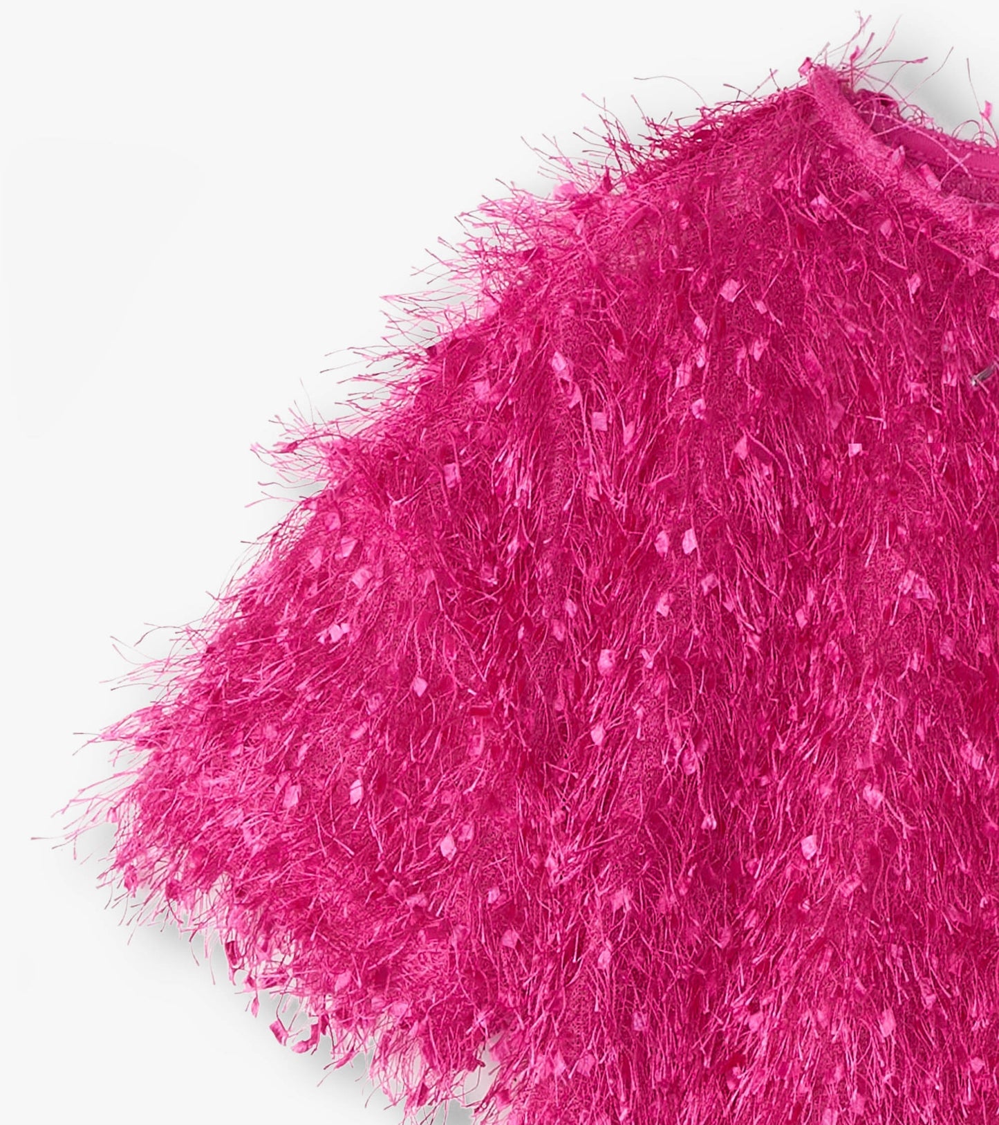 Fluffy knit sweater in vibrant rose violet with a textured, playful design and short sleeves.