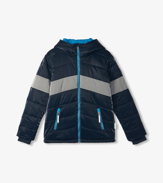 Navy puffer jacket with gray chevron stripes, hood, and blue accents; features zippered pockets and a front zipper.