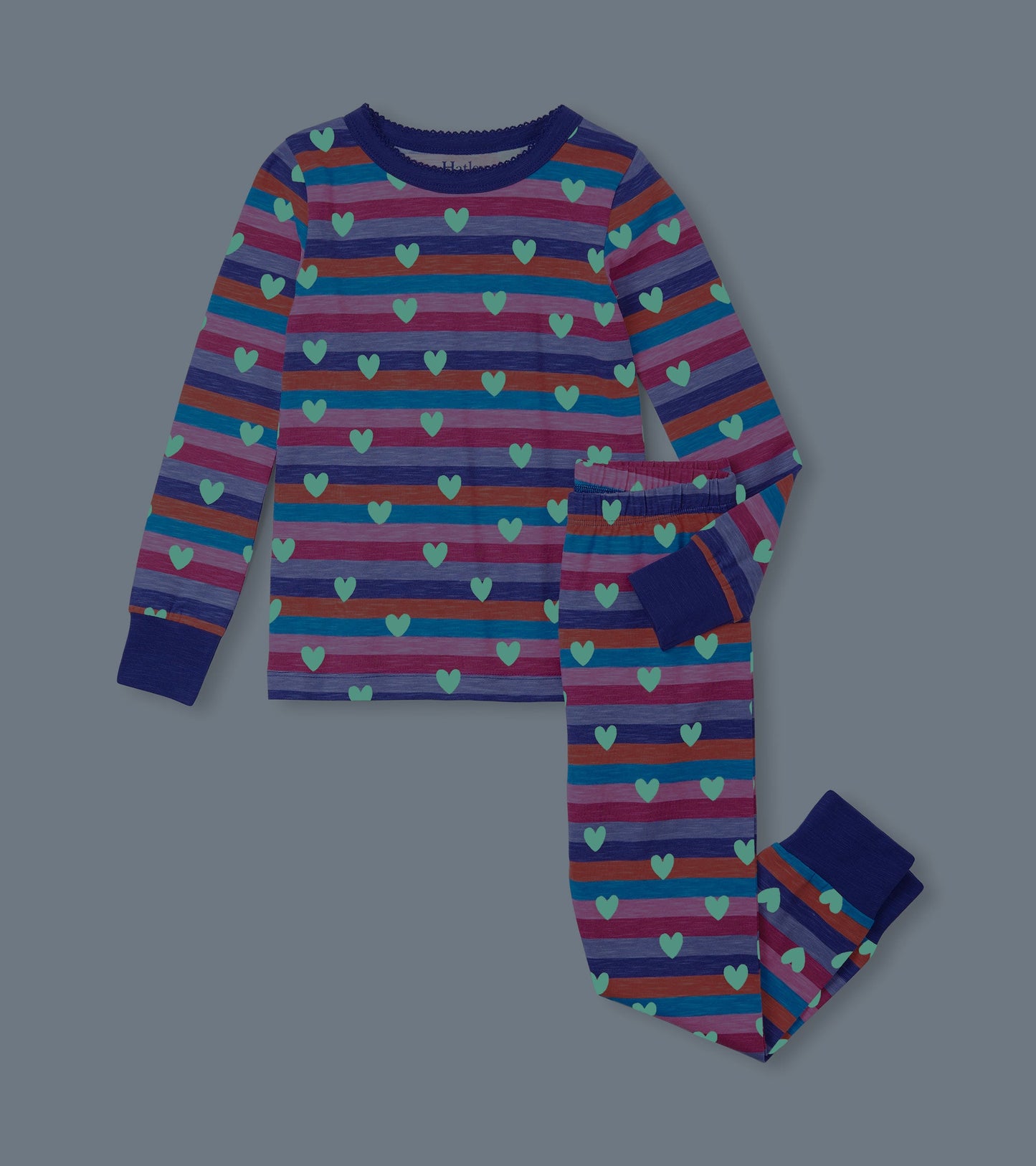 Purple striped pajama set featuring hearts, long sleeves, and elastic waistband pants.
