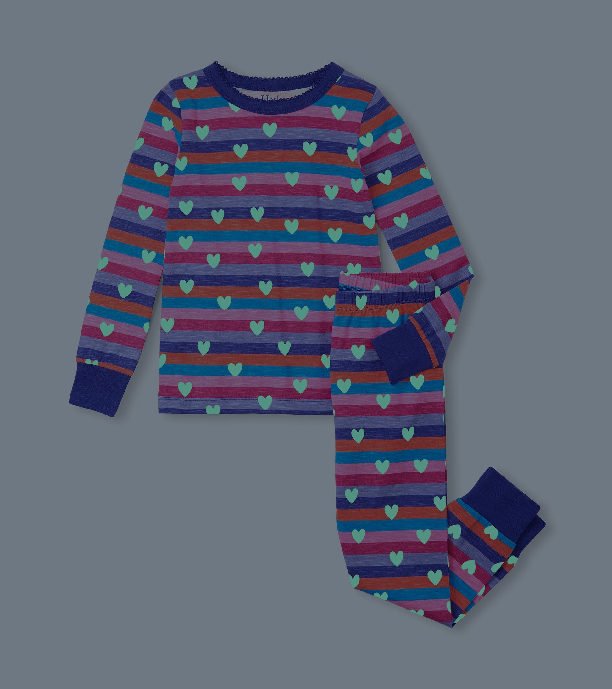 Purple striped pajama set featuring hearts, long sleeves, and elastic waistband pants.