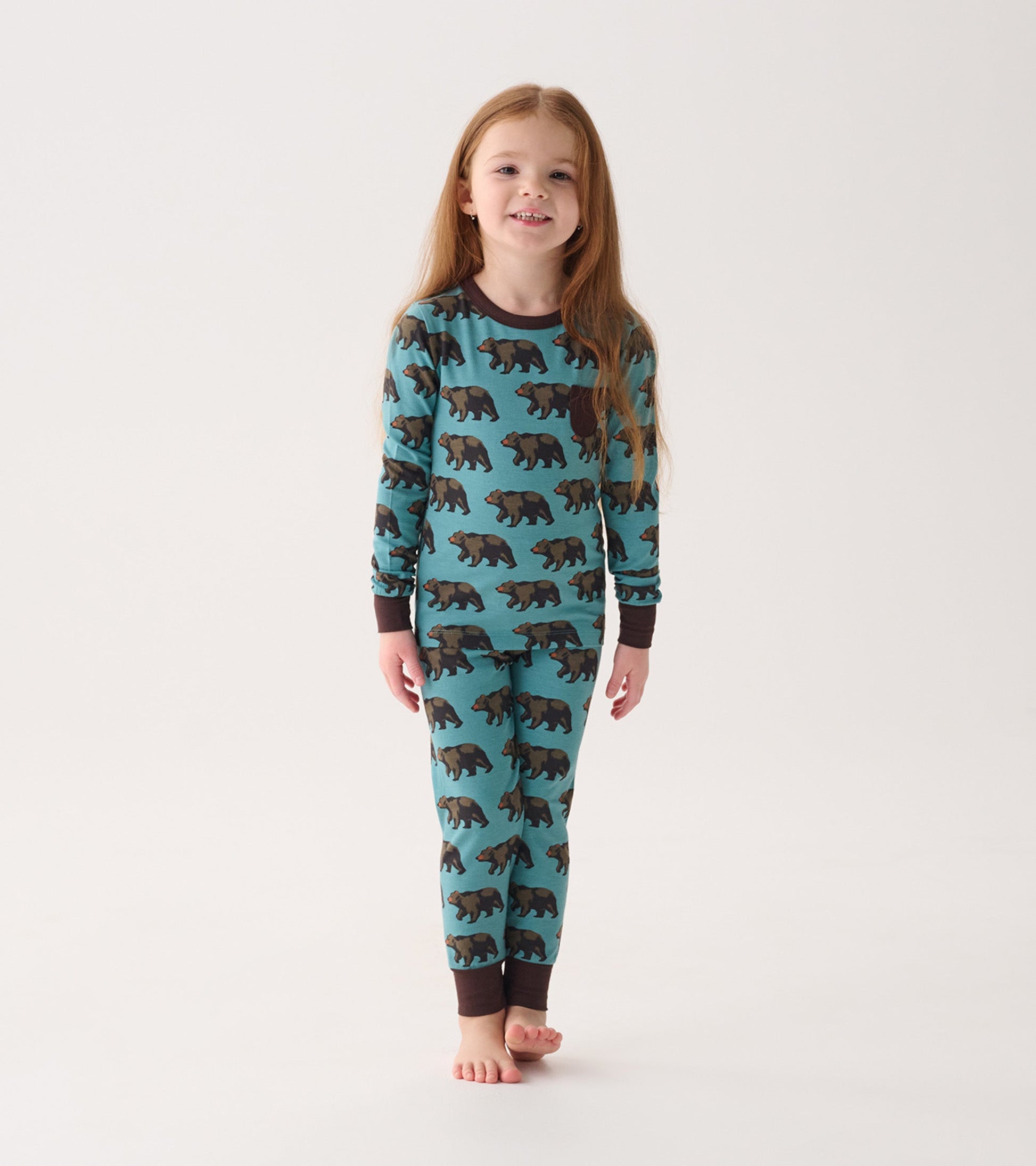 Turquoise bamboo pajama set featuring brown bear patterns, long sleeves, and matching pants. Suitable for boys.