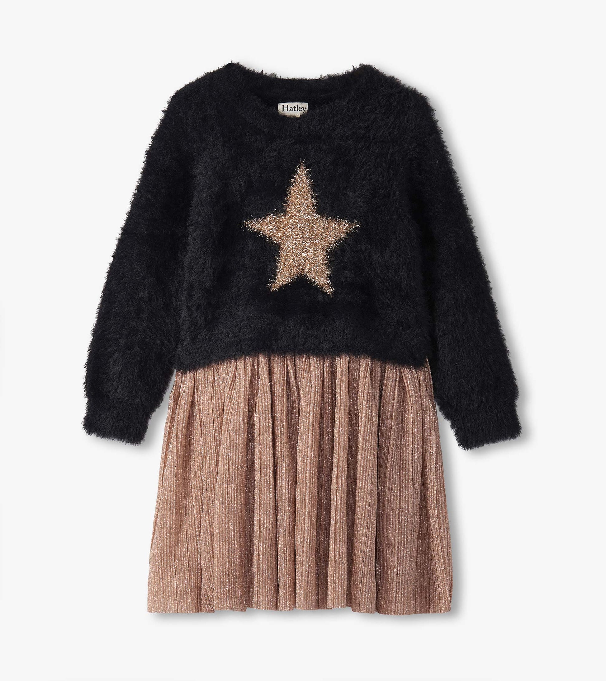 Black fuzzy top with a gold star design, paired with a pleated, shimmery rose gold skirt.