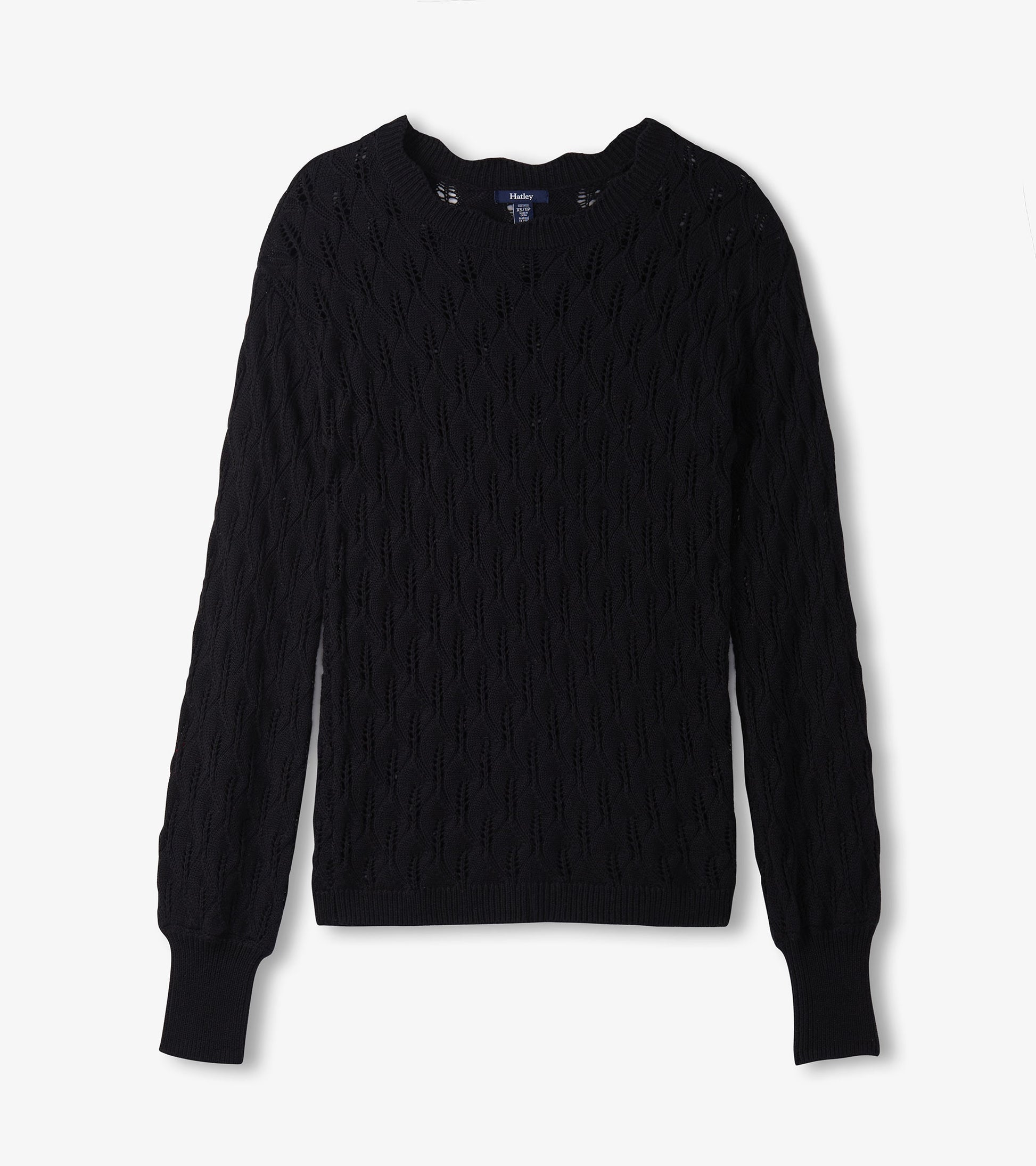Black knitted sweater featuring a textured pattern and ribbed cuffs, designed for a relaxed fit.