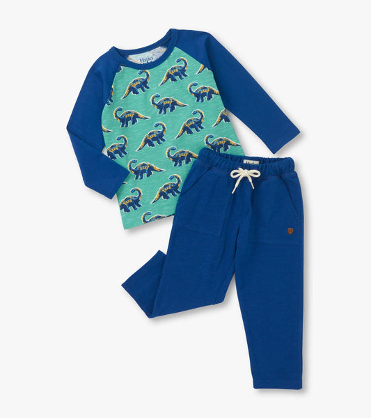 Blue raglan lounge set featuring a green dinosaur-patterned top and matching blue pants with pockets and drawstring.