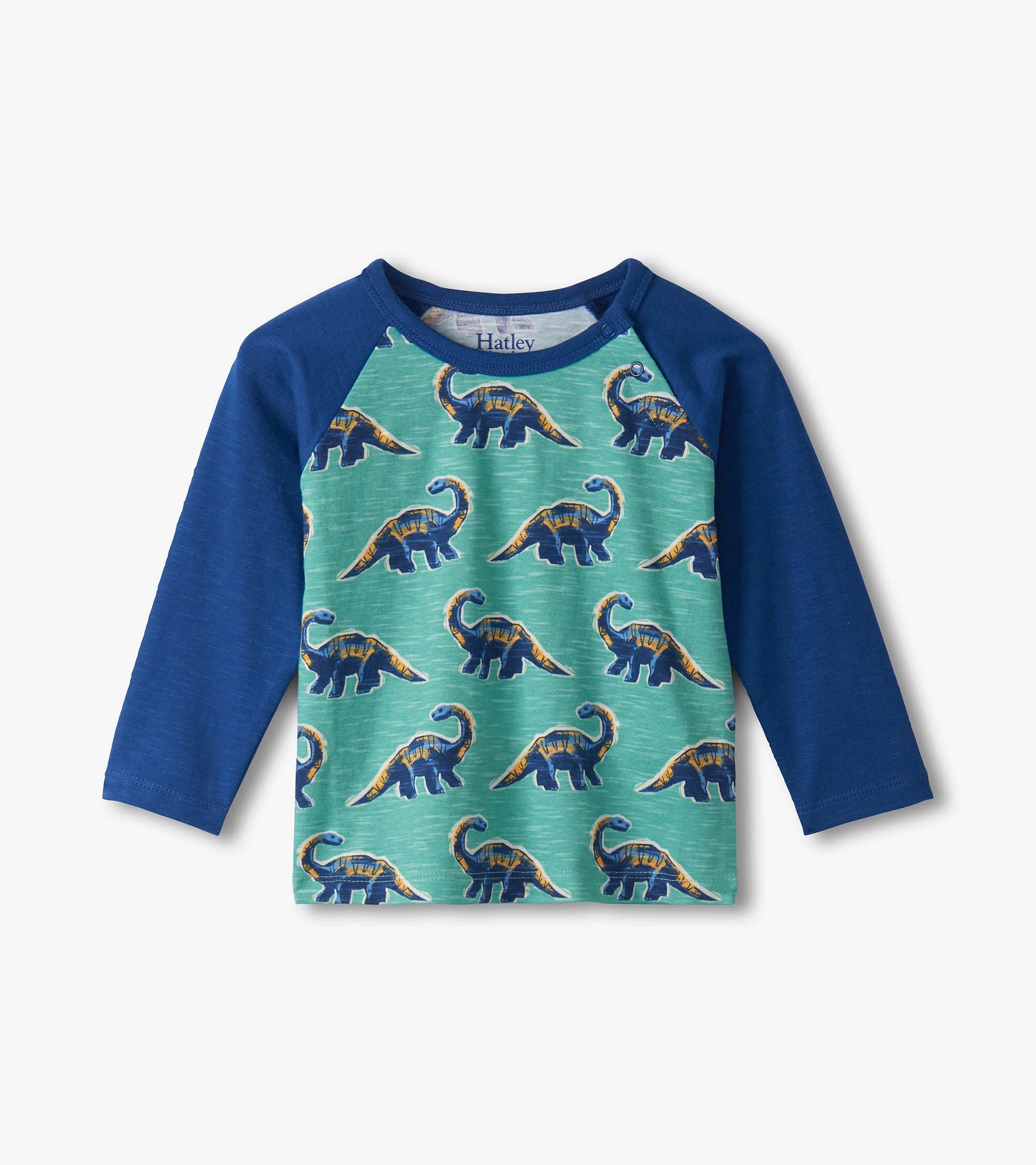 Long-sleeve raglan lounge set featuring a green body with blue sleeves and colorful dinosaur prints.