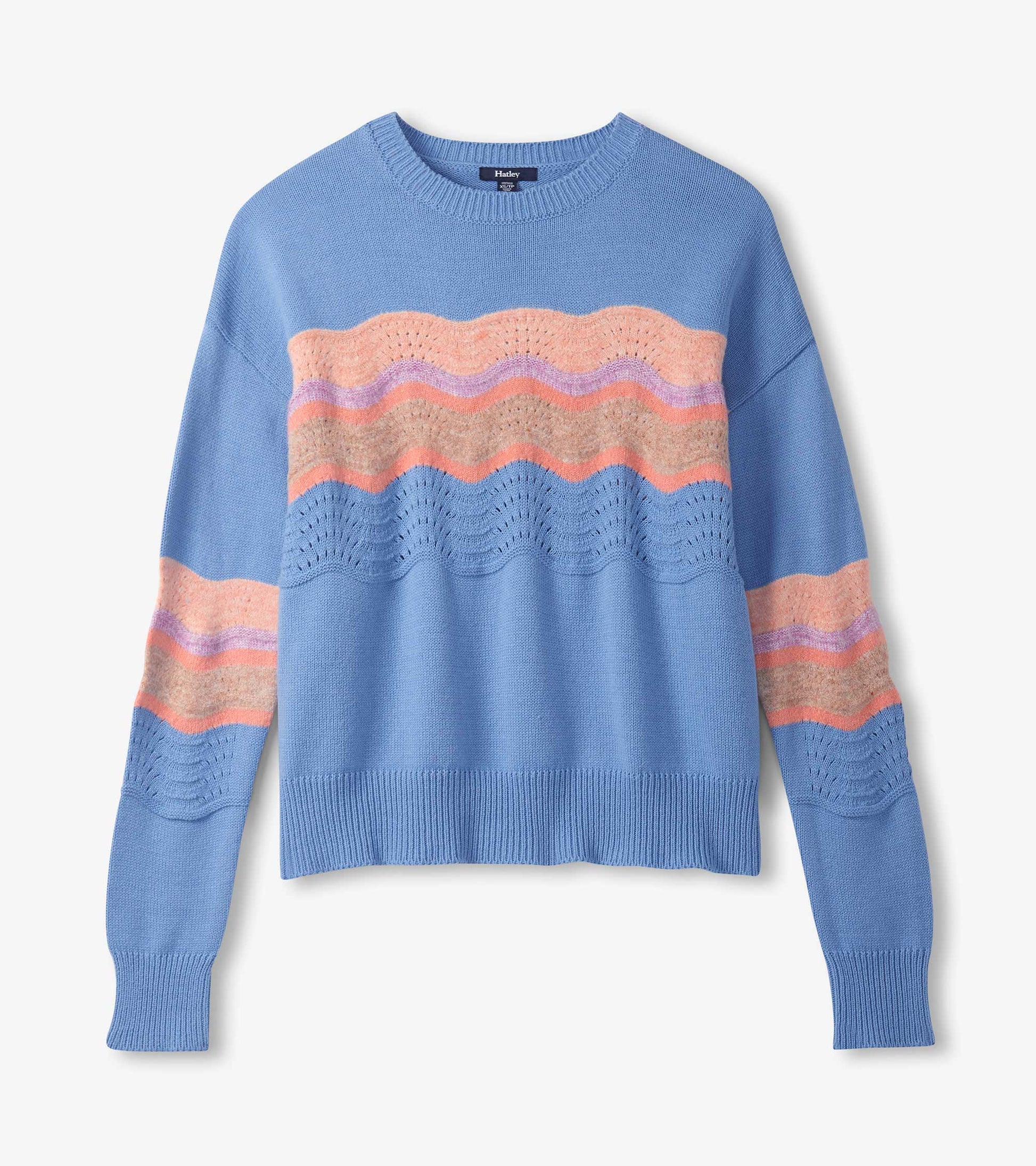 Sky blue sweater featuring a wave pattern in pink and purple, with a relaxed fit and ribbed hem.