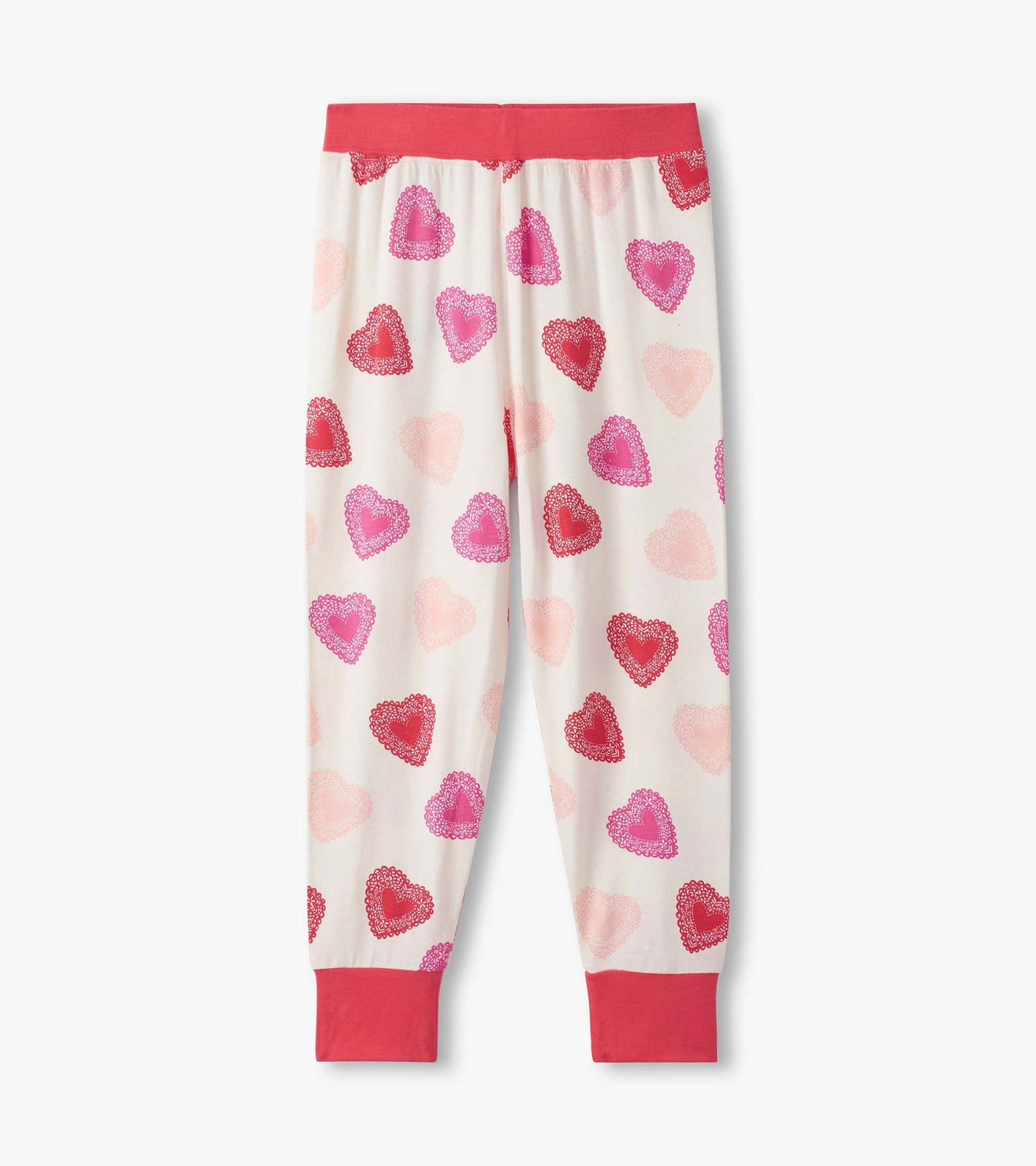 Bamboo pajama set featuring a white background with colorful heart patterns in pink and red, with a pink waistband.