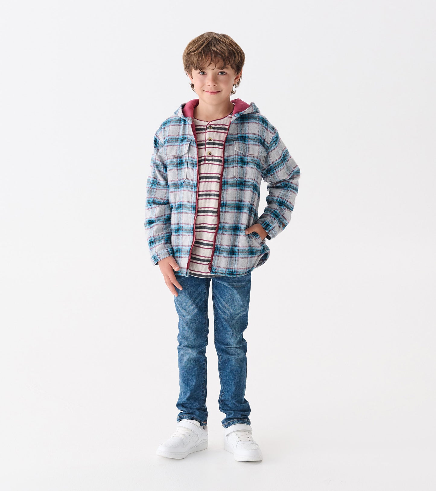 Hooded jacket in charcoal and maroon plaid, featuring a front zipper and two pockets, worn by a boy with a striped shirt.