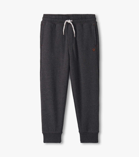 Charcoal melange joggers with an elastic waistband, drawstring, and side pockets. Suitable for casual wear.