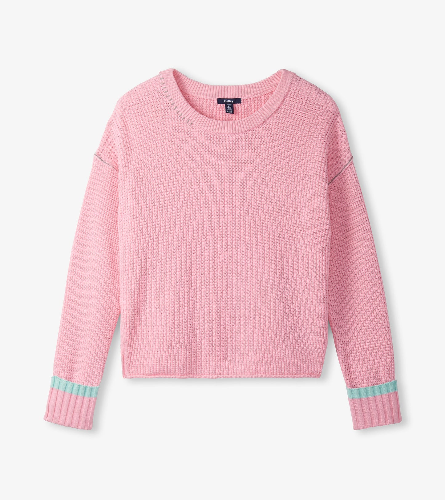 Fuchsia pink waffle knit sweater with ribbed cuffs featuring mint green accents, designed for casual wear.