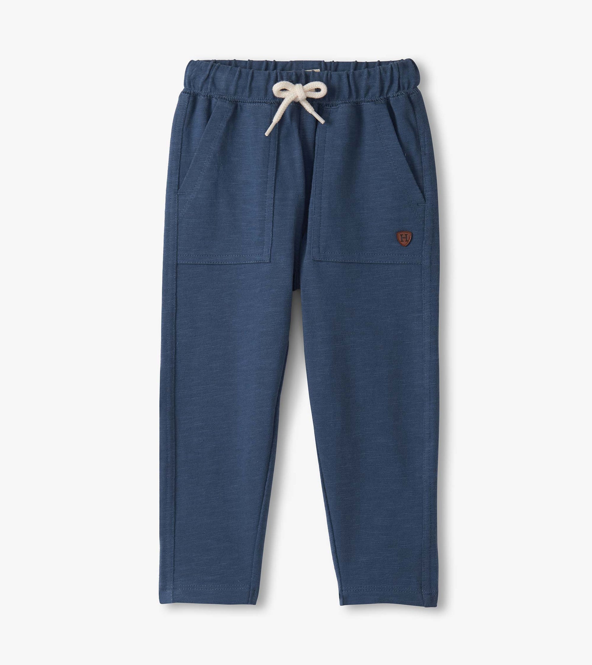 Navy blue lounge pants with an elastic waistband, drawstring, and two front pockets. Soft fabric suitable for toddlers.