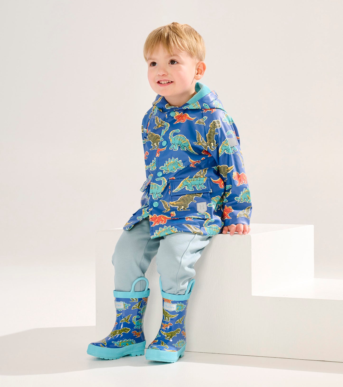Imperméable orné de boutons pression – Dinosaures rugissants